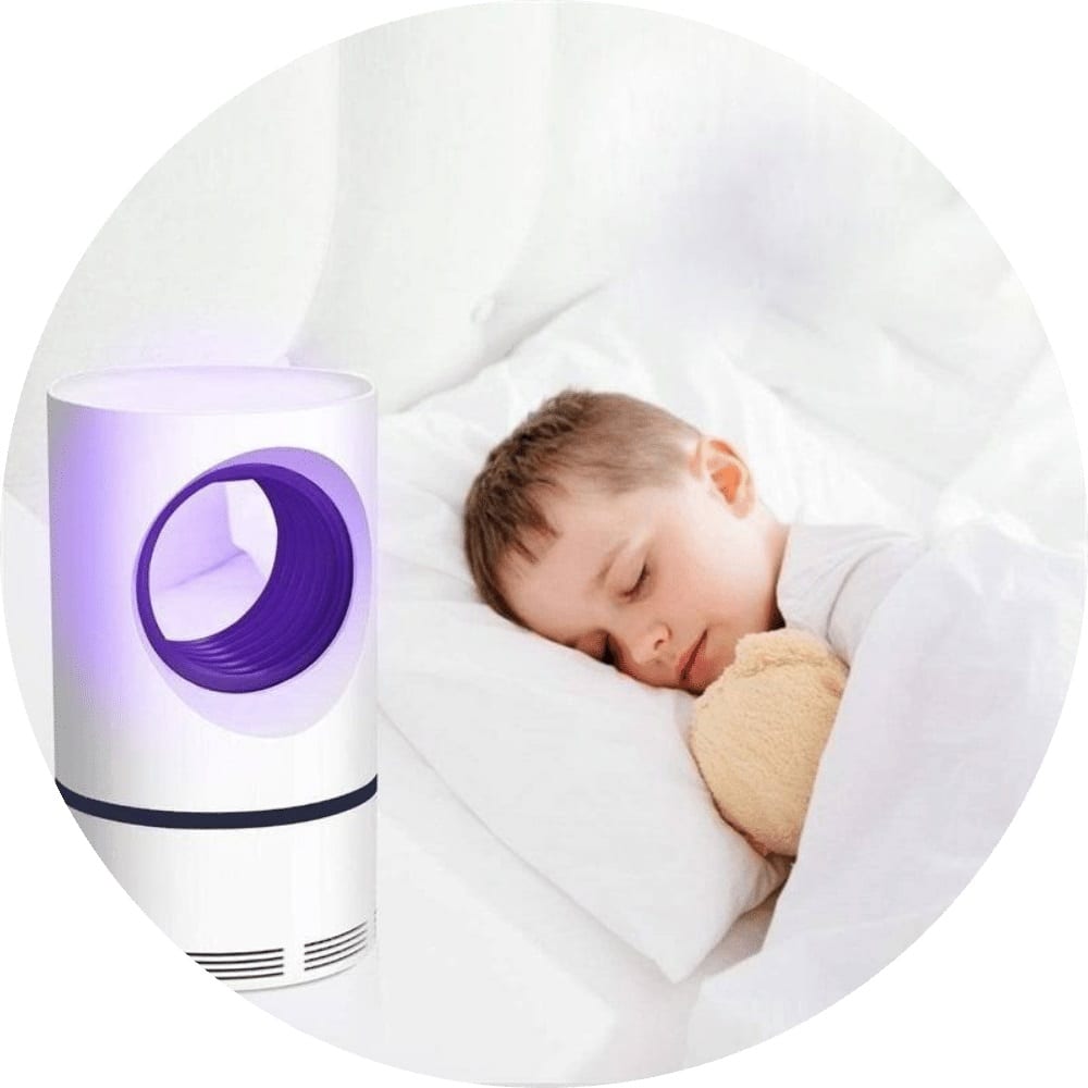 Quiet indoor mosquito trap glowing softly in a bedroom
